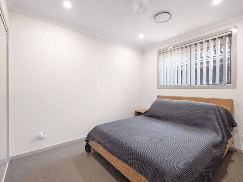9 Banfield Drive, ORAN PARK, NSW 2570